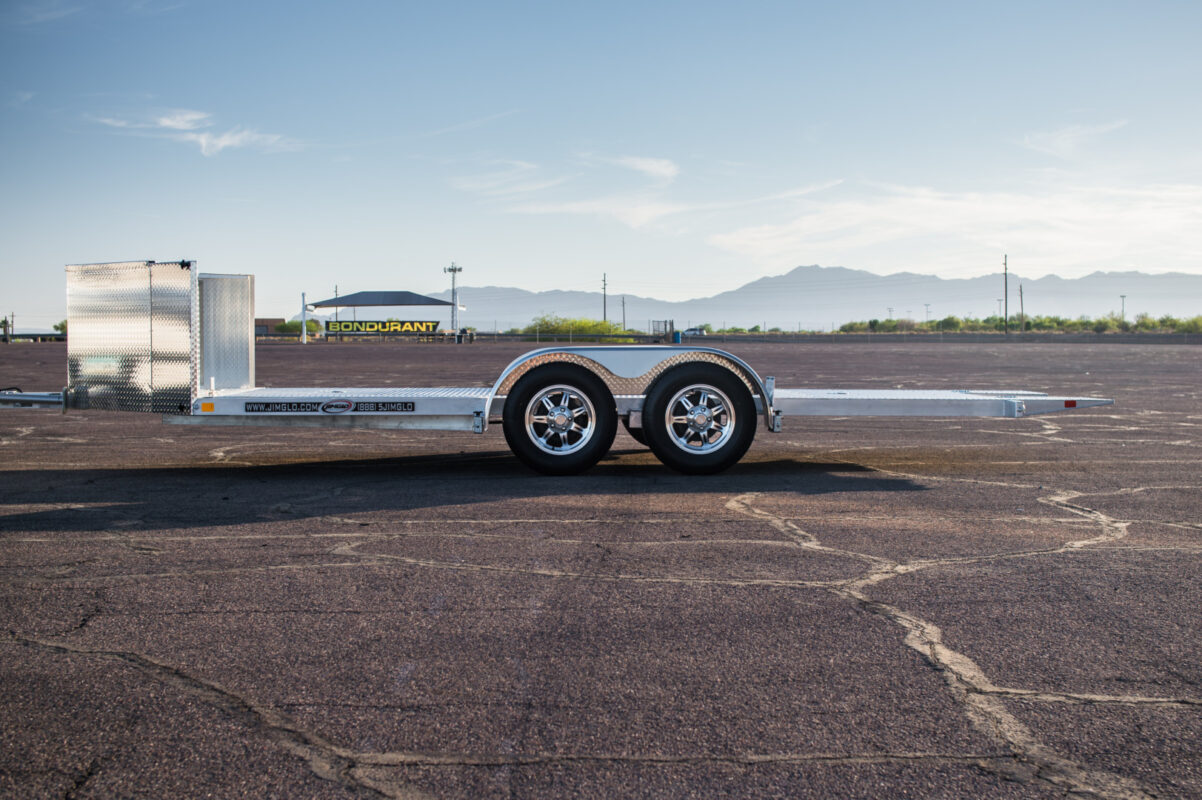 jimglo ego aluminum tilt bed trailer with the bed up in the transport position.