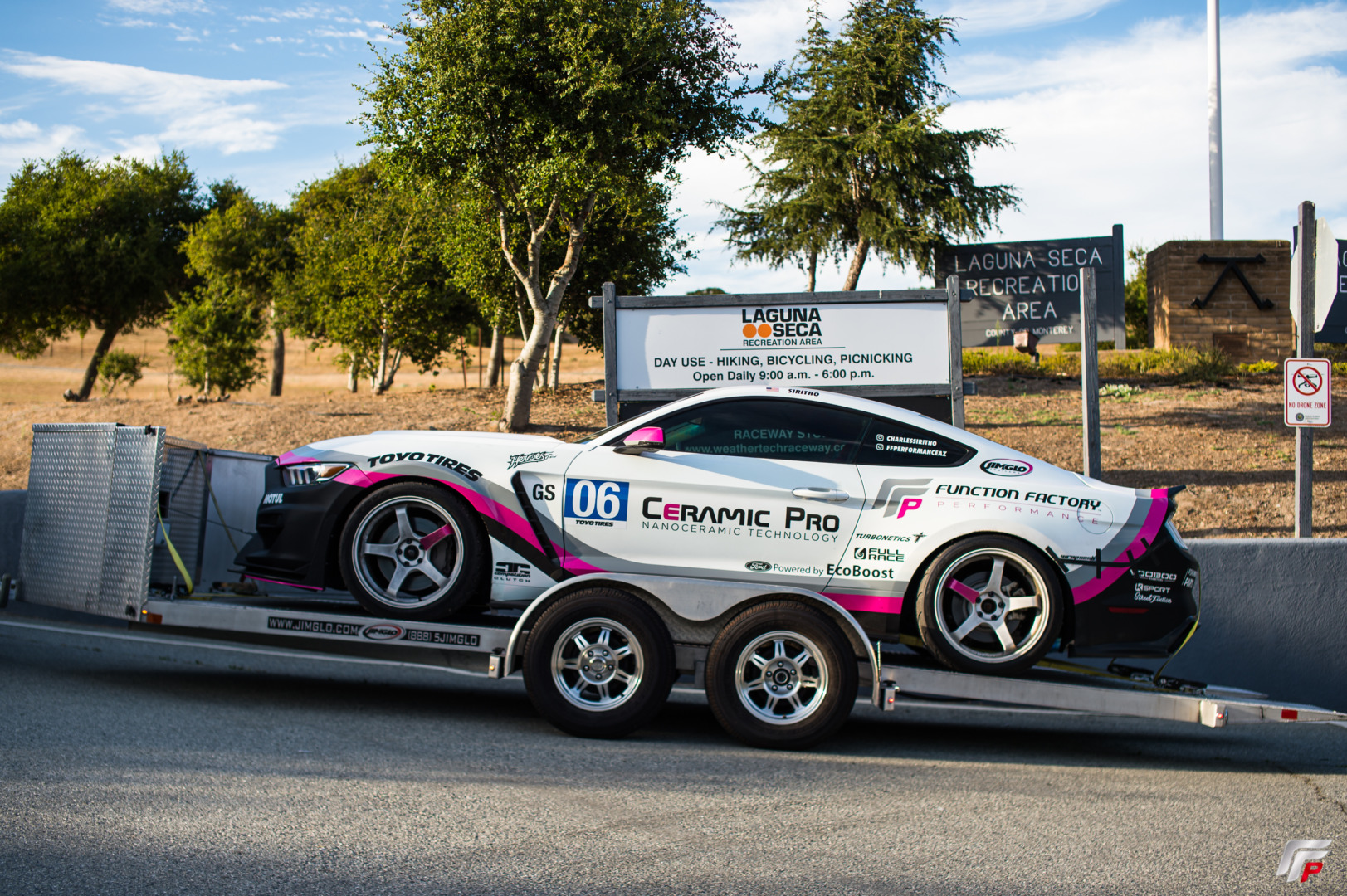 Function Factory Race Car On A Jimglo Ego Tilt Bed Trailer.