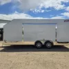 a white JIMGLO Elite Enclosed Car trailer with wheels