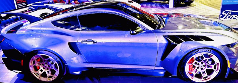 a car parked in a showroom ford mustang gtd
