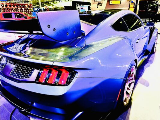 a blue sports car with a spoiler ford mustang gtd